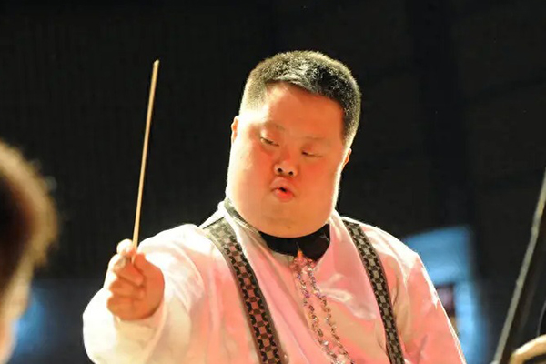 一般唐氏儿一周岁才能明显看出来吗?