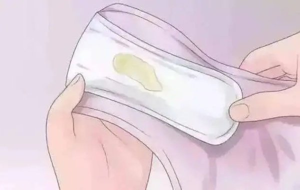 移植冻胚七天后白带有点黄是着床成功了吗？